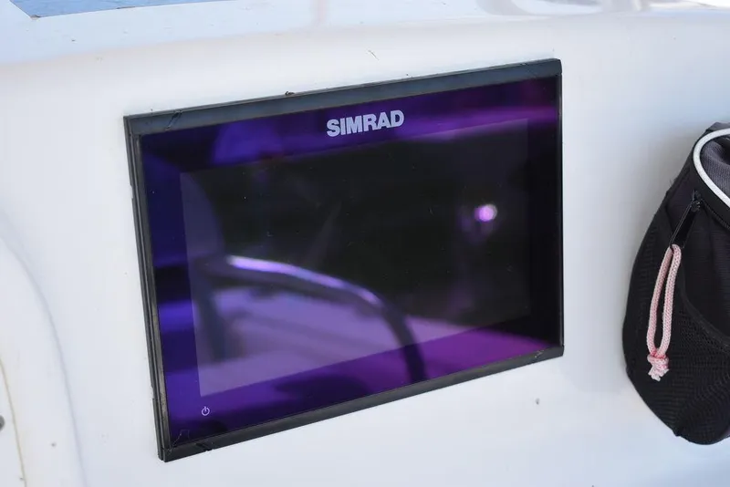 Slide: The Image of Simrad display on 2006 Pro-Line 21 Sport Center Console boat. - 36