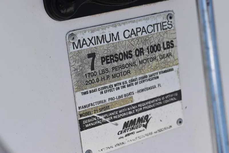 Slide: The Image of 2006 Pro-Line 21 Sport Center Console maximum capacity label, 7 persons or 1000 lbs. - 40