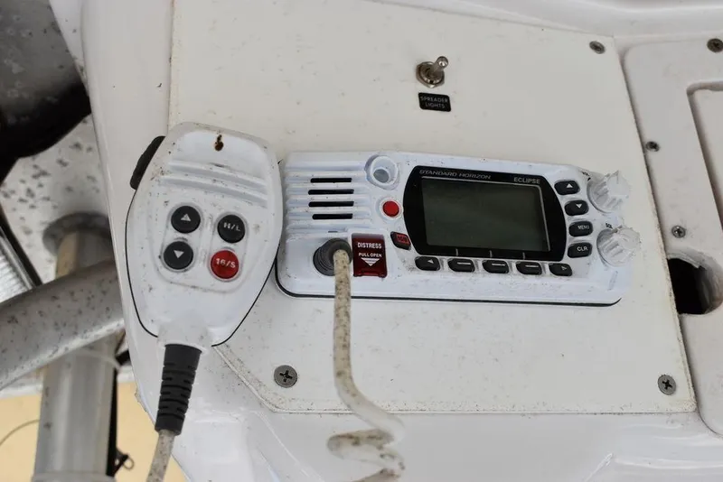 Slide: The Image of Close-up of the control panel on a 2006 Pro-Line 21 Sport Center Console boat. - 42
