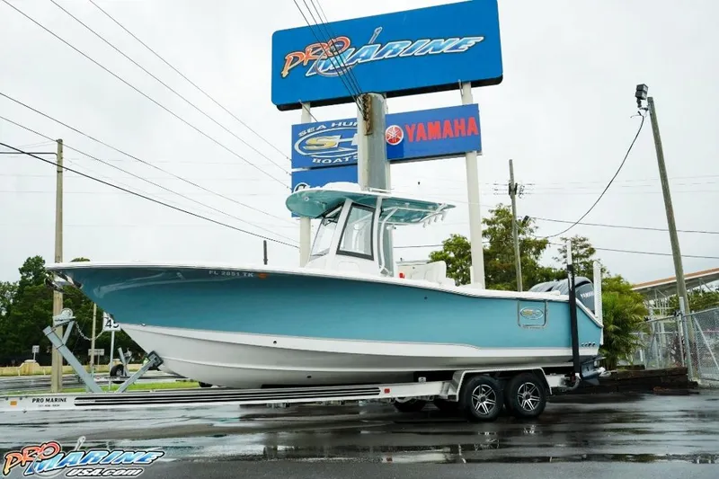 The Image of 2023 Sea Hunt Ultra 275 SE boat on trailer at Pro Marine dealership. - 0