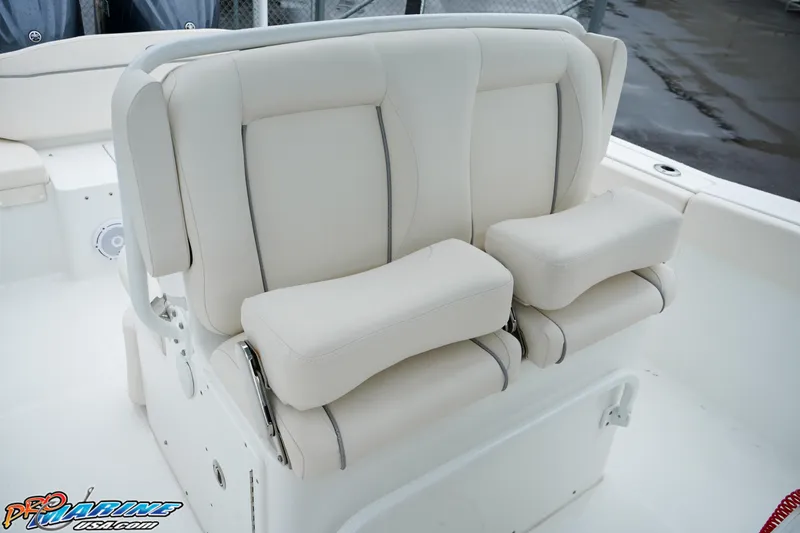 Slide: The Image of 2023 Sea Hunt Ultra 275 SE boat seating with cushioned armrests - 13