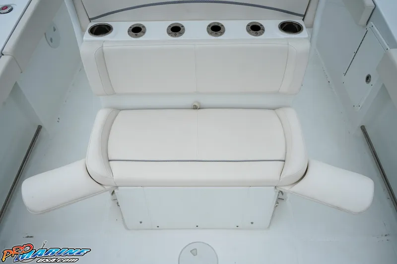 Slide: The Image of 2023 Sea Hunt Ultra 275 SE boat seating with cup holders. - 15