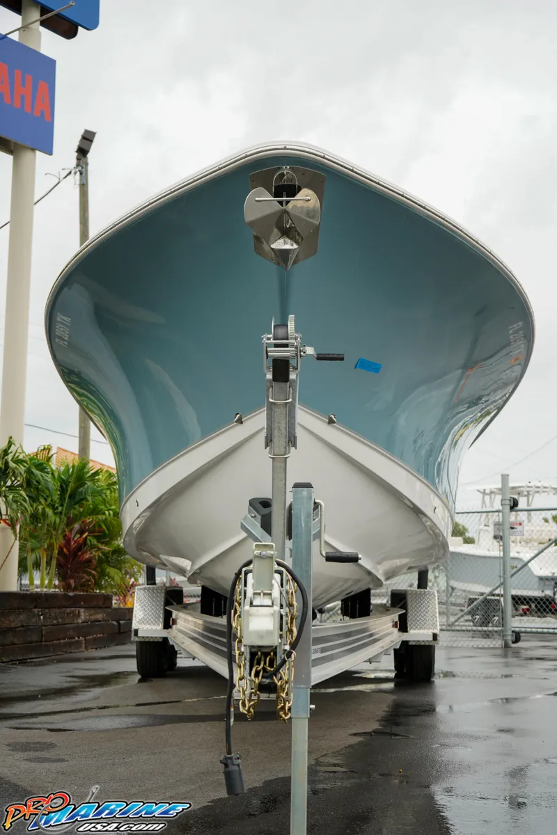 Slide: The Image of 2023 Sea Hunt Ultra 275 SE boat on trailer, front view. - 3