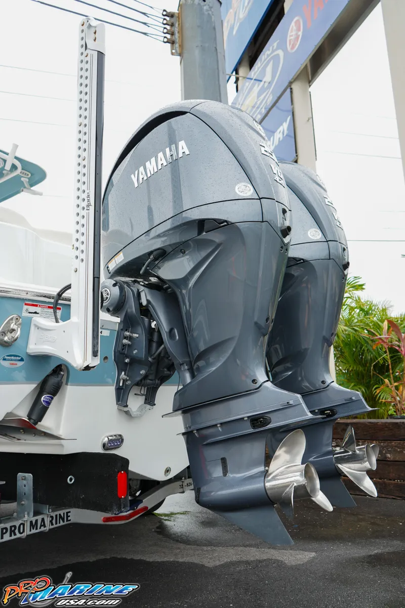 Slide: The Image of 2023 Sea Hunt Ultra 275 SE with twin Yamaha outboard engines. - 5