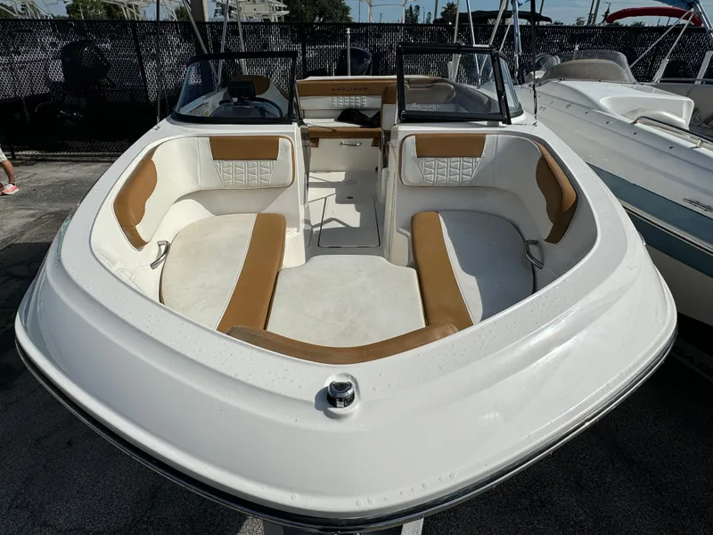 Slide: The Image of 2021 Bayliner VR5 Bowrider OB with spacious seating and modern design. - 2