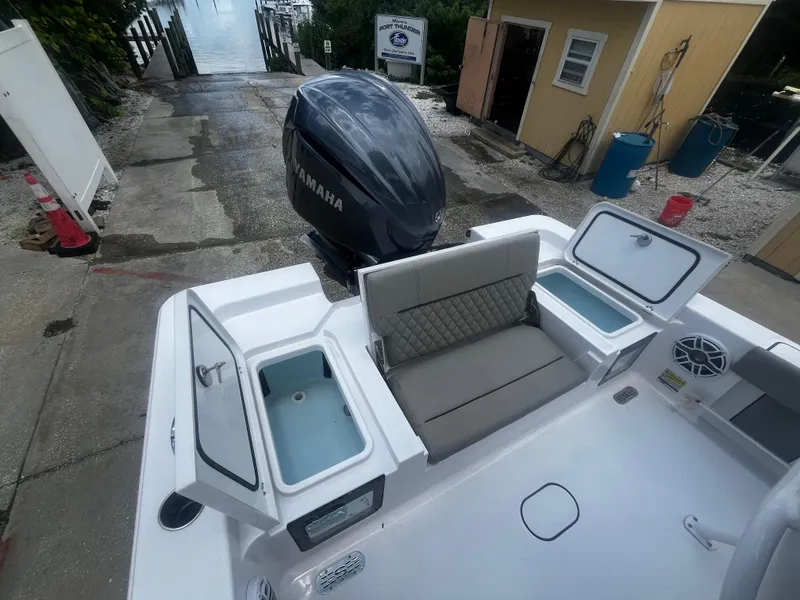 Slide: The Image of 2025 Sportsman Masters 227 Bay Boat with Yamaha engine at dock. - 9