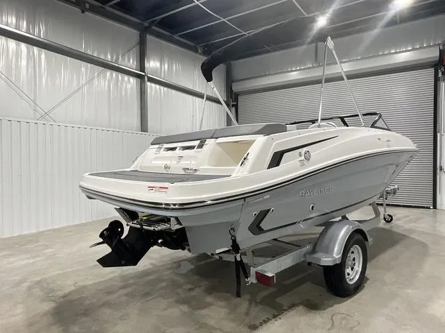 Slide: The Image of 2024 Bayliner VR5 Bowrider in a storage facility. - 3