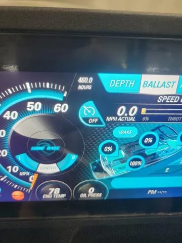 Slide: The Image of Dashboard of a 2015 Malibu 247 LSV boat showing speed and engine metrics. - 7