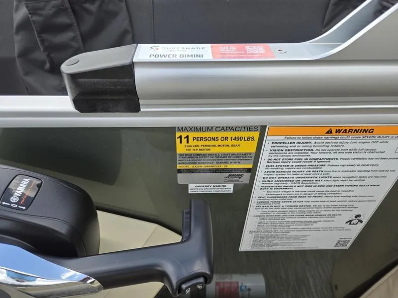 Slide: The Image of 2024 Godfrey Sweetwater 2086 C pontoon boat with beige seating and spacious deck. - 10