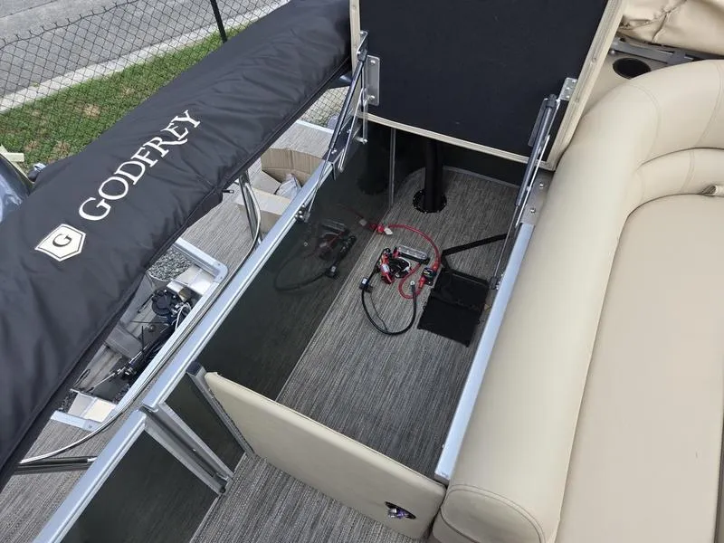 Slide: The Image of 2024 Godfrey Sweetwater 2086 C capacity label, 11 persons or 1490 lbs, safety instructions. - 15