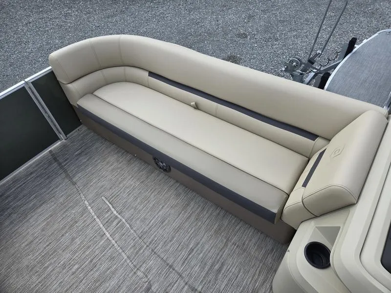 Slide: The Image of 2024 Godfrey Sweetwater 2086 C pontoon boat with motor and railing, viewed from above. - 5