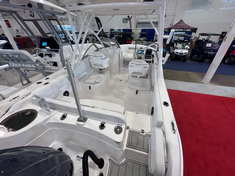 Slide: The Image of 2025 Sea Fox 228 Traveler boat interior at a showroom display. - 20