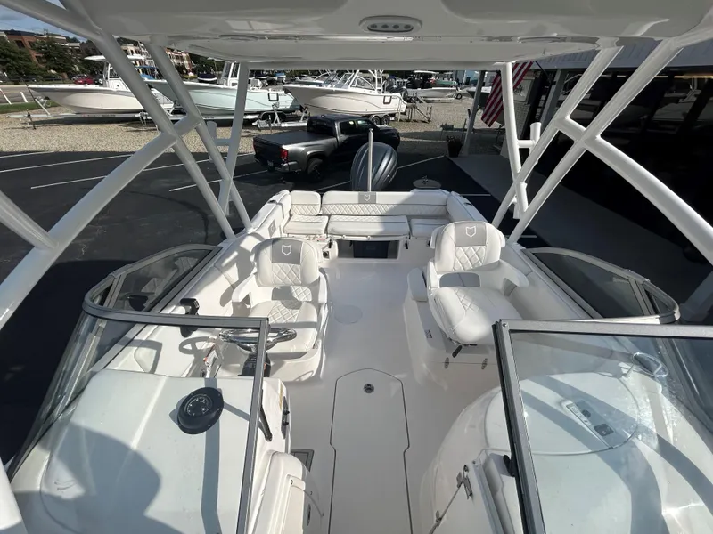 Slide: The Image of 2025 Sea Fox 228 Traveler boat interior with seating and steering console. - 23