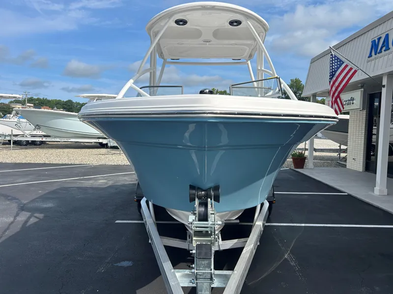 Slide: The Image of 2025 Sea Fox 228 Traveler boat on trailer, displayed outdoors. - 3