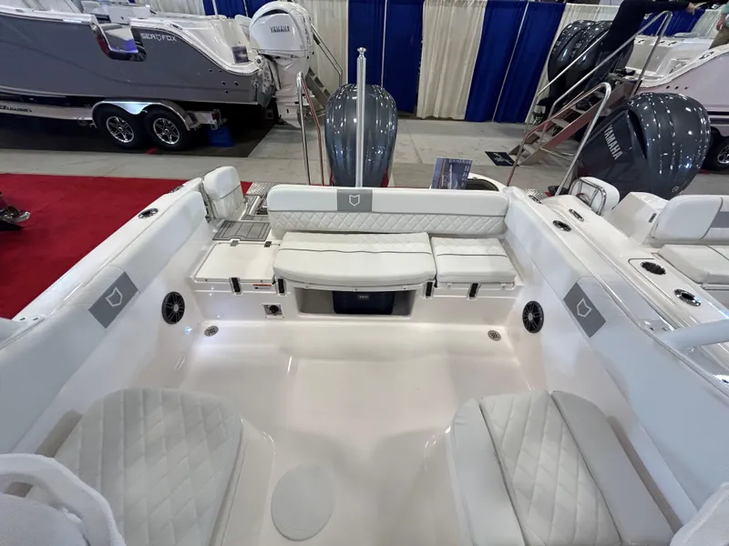 Slide: The Image of 2025 Sea Fox 228 Traveler boat interior with white seating and modern design. - 30