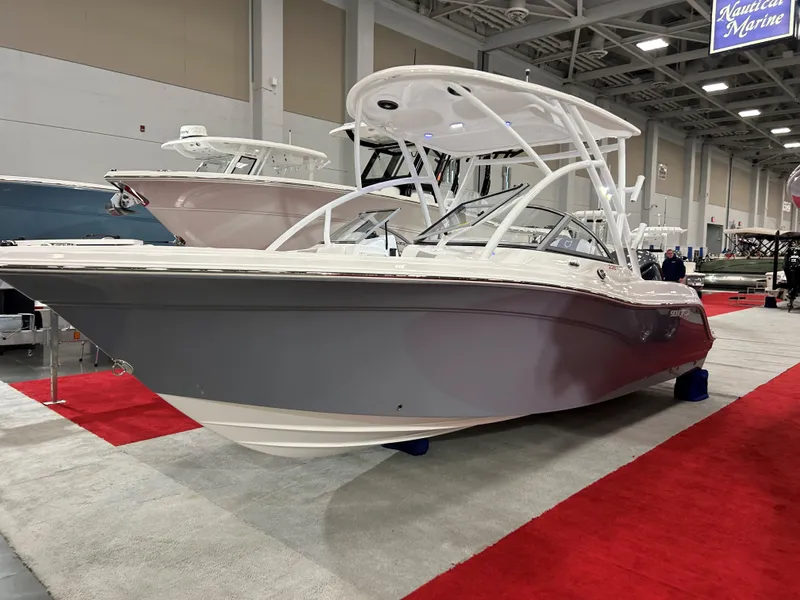 The Image of 2025 Sea Fox 228 Traveler boat displayed at an indoor exhibition. - 0
