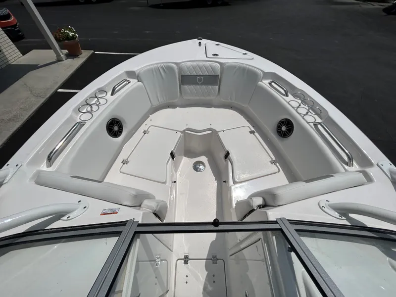 Slide: The Image of 2025 Sea Fox 228 Traveler boat interior with seating and cup holders. - 13