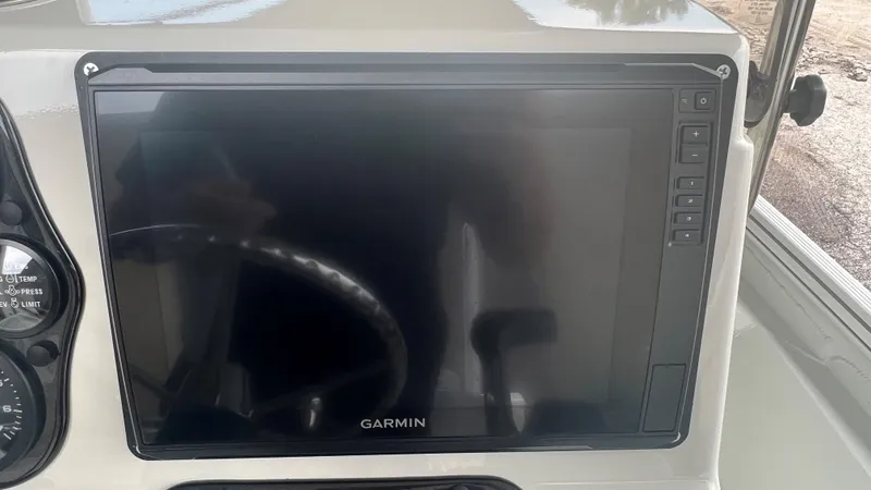 Slide: The Image of Garmin display on 2023 Excel 220 Bay Pro boat dashboard. - 12