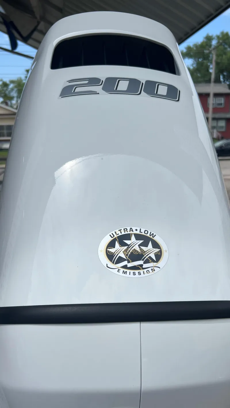 Slide: The Image of Close-up of 2023 Excel 220 Bay Pro outboard motor with Ultra-Low Emission sticker. - 20