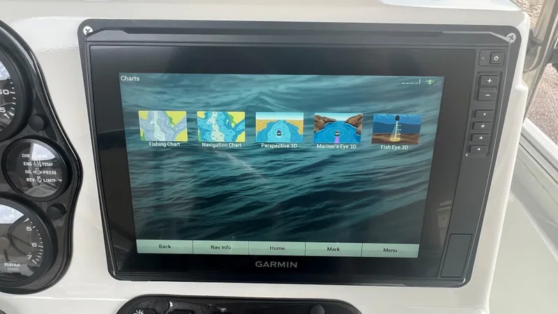 Slide: The Image of Garmin navigation display on 2023 Excel 220 Bay Pro boat showing various chart options. - 5