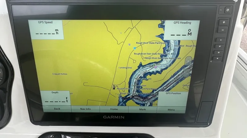 Slide: The Image of Garmin GPS display on 2023 Excel 220 Bay Pro boat showing Rough River Lake map. - 6