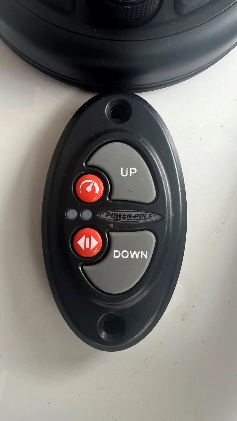 Slide: The Image of Power-Pole shallow water anchor control panel on 2023 Excel 220 Bay Pro boat. - 9