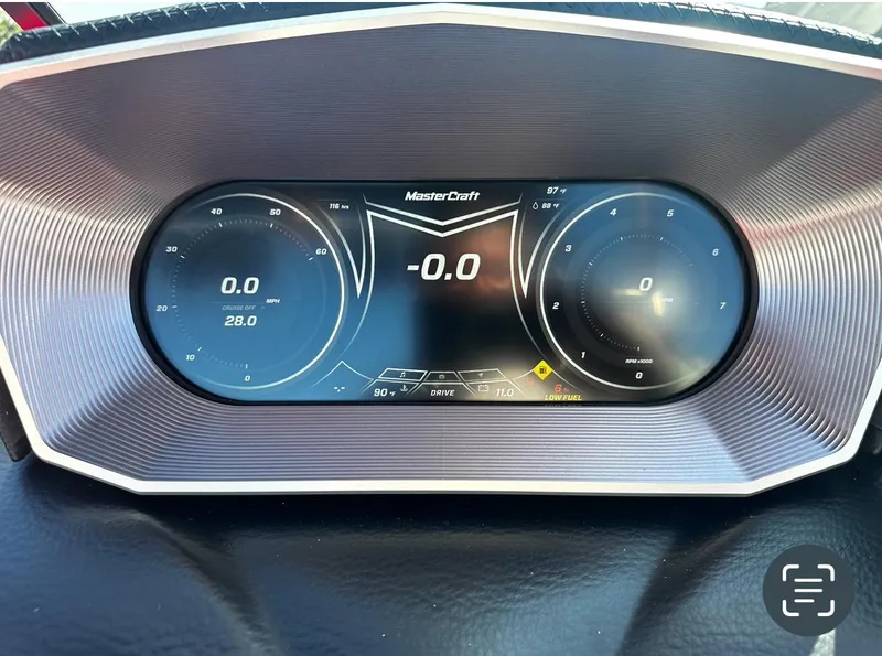 Slide: The Image of 2020 MasterCraft X24 digital dashboard display showing speed and other metrics. - 19