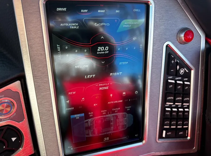 Slide: The Image of 2020 MasterCraft X24 touchscreen control panel with various settings and features. - 22
