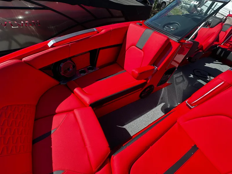 Slide: The Image of 2020 MasterCraft X24 boat with vibrant red interior and sleek design. - 7