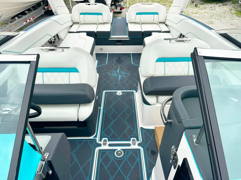 Slide: The Image of 2023 Regal LS6 boat interior with luxurious seating and modern design. - 6