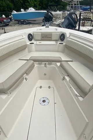 Slide: The Image of 2019 Sea Chaser 27 HFC CC boat interior with seating and storage compartments. - 5