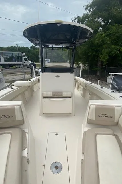 Slide: The Image of 2019 Sea Chaser 27 HFC CC center console boat with seating and T-top. - 6