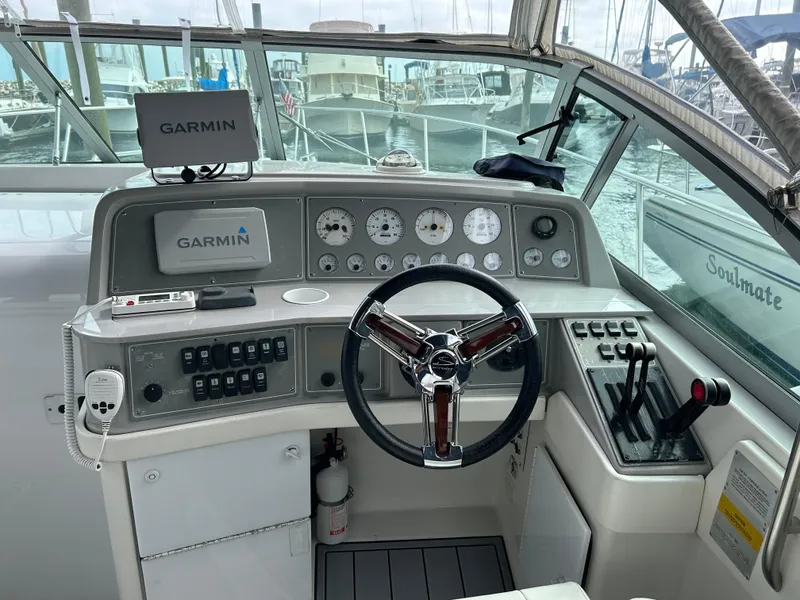 Slide: The Image of Cockpit of 2000 Formula 34 PC boat with Garmin navigation system and control panel. - 14
