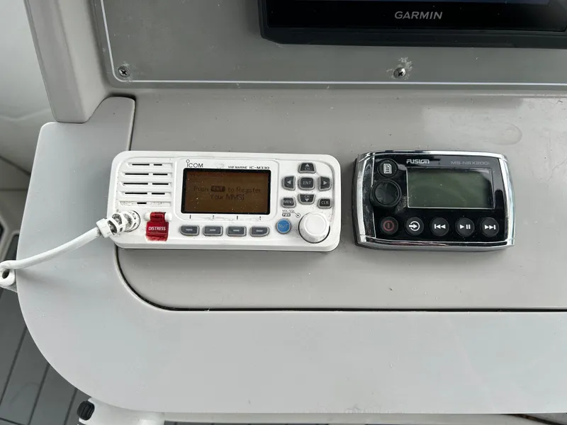 Slide: The Image of Control panel of a 2000 Formula 34 PC boat with radio and navigation devices. - 18
