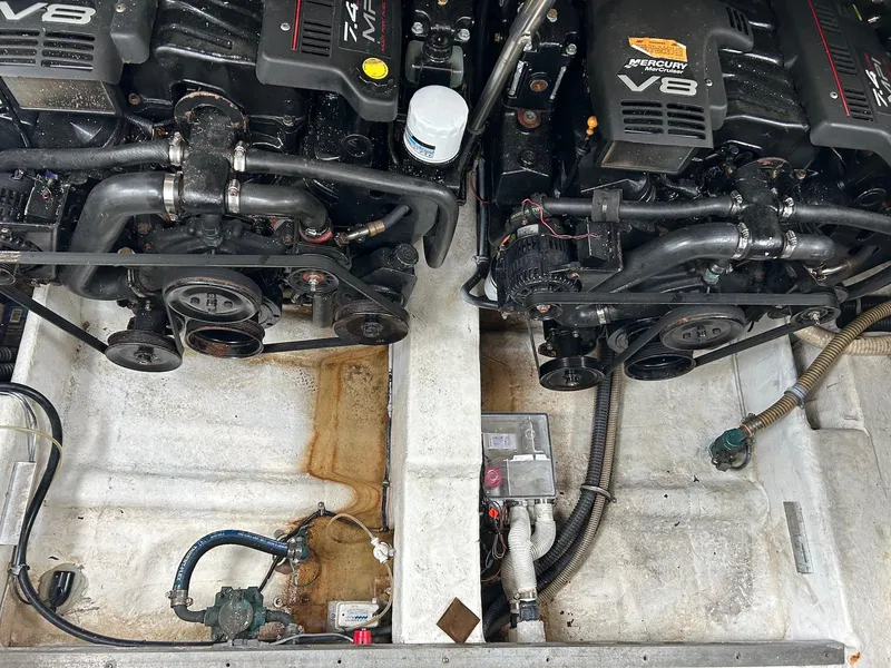 Slide: The Image of Engine compartment of a 2000 Formula 34 PC boat with twin MerCruiser V8 engines. - 22