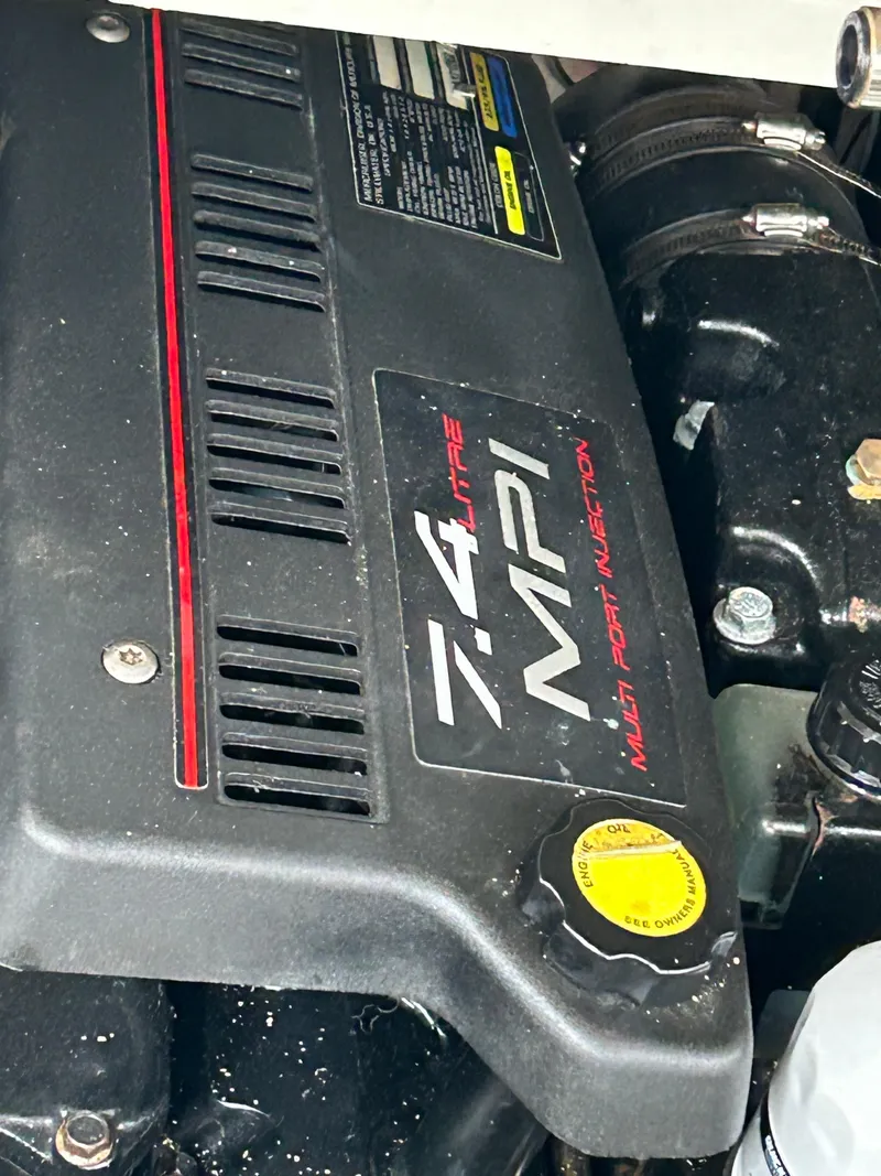 Slide: The Image of Engine of a 2000 Formula 34 PC boat, featuring 7.4 MPI multi-port injection. - 23