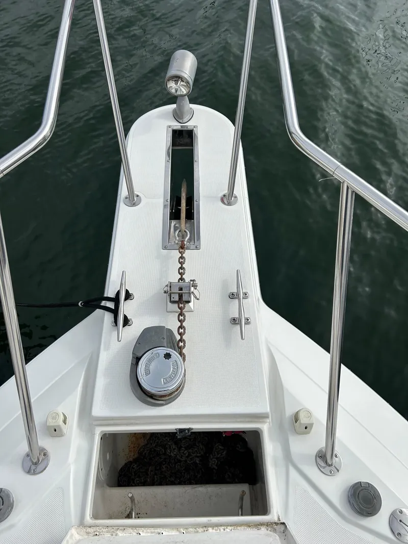 Slide: The Image of Bow of a 2000 Formula 34 PC boat with anchor chain and railing. - 7