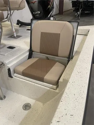 Slide: The Image of 2024 Xpress H22B boat with Yamaha 175 SHO engine, featuring a beige and brown seat. - 12