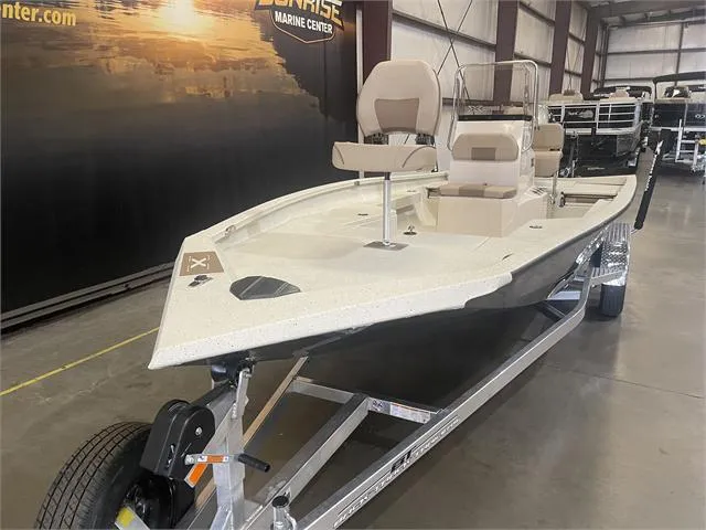 Slide: The Image of 2024 Xpress H22B boat with Yamaha 175 SHO engine on trailer in showroom. - 5