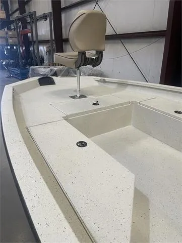 Slide: The Image of 2024 Xpress H22B boat interior with Yamaha 175 SHO engine, featuring a beige seat. - 9