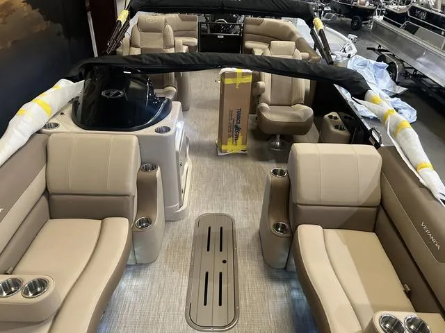 Slide: The Image of Interior of 2025 Veranda VR25RC pontoon boat with Yamaha 250 SHO engine, beige seating. - 13