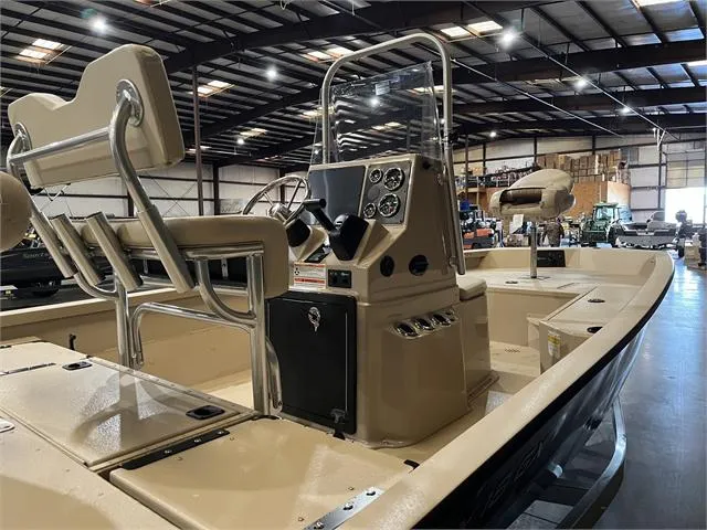 Slide: The Image of 2024 G3 Bay 18GX boat with Yamaha 115 SHO engine in a warehouse. - 7