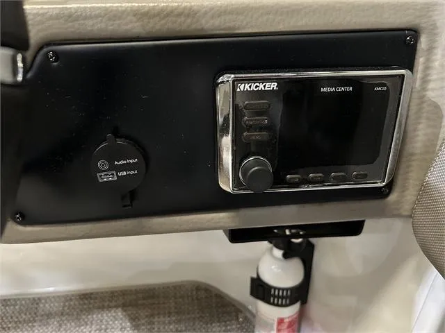 Slide: The Image of Kicker media center and audio input on 2018 Crownline E21X boat. - 13