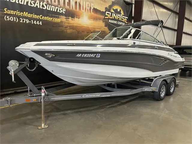 Slide: The Image of 2018 Crownline E21X boat on trailer at Sunrise Marine Center. - 2