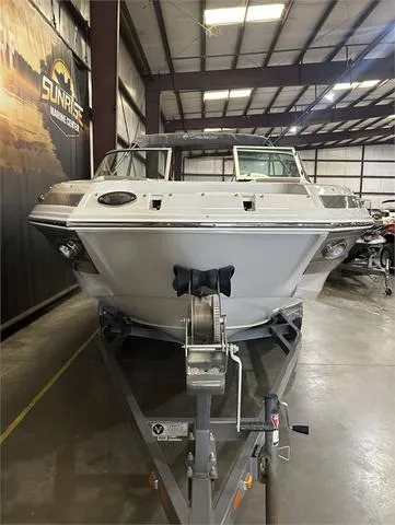 Slide: The Image of 2018 Crownline E21X boat on trailer in indoor storage facility. - 3