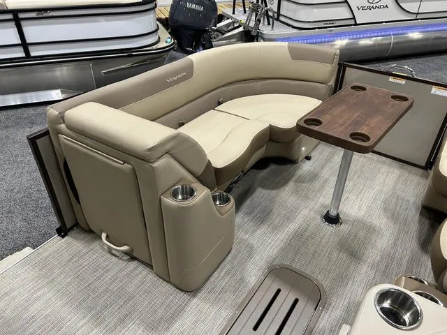 Slide: The Image of Close-up of Veranda VR22RFL 2024 boat interior with Yamaha 150, featuring illuminated speaker. - 12