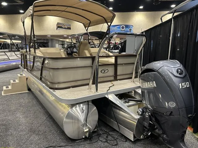 Slide: The Image of 2024 Veranda VR22RFL W/Yamaha 150 interior, illuminated speaker and seating area. - 13