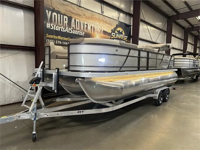 Slide: The Image of 2024 Veranda VR22RFL pontoon boat with Yamaha 150, displayed indoors on a trailer. - 16