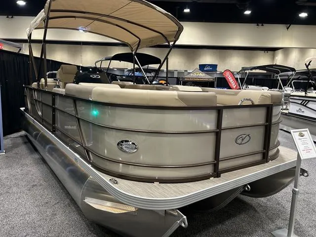 Slide: The Image of 2024 Veranda VR22RFL pontoon boat with Yamaha 150 engine on display in a showroom. - 3