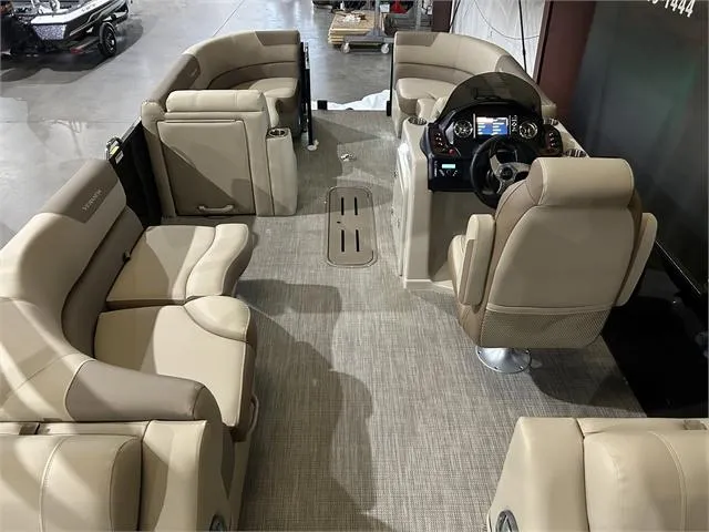 Slide: The Image of 2024 Veranda VR22RFL pontoon boat interior with Yamaha 150, featuring luxurious seating and modern helm. - 12